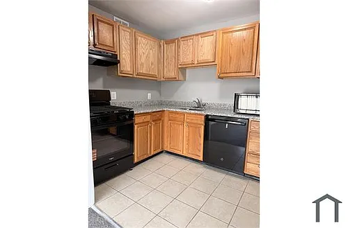 903 Woodson Rd #F Photo 1