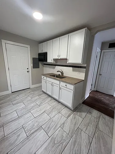 7244 Orchard Ave Photo 1