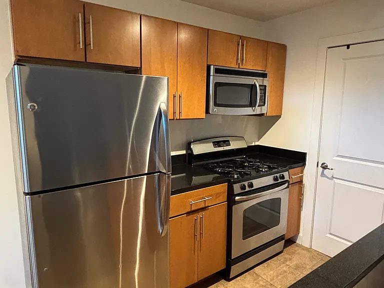 Gas stove and ample kitchen storage.