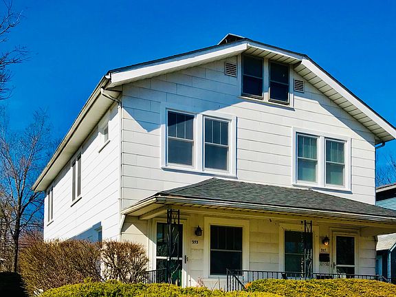 Left side of house. The house has been painted, deep grey. I can_t get the photo to come up.
