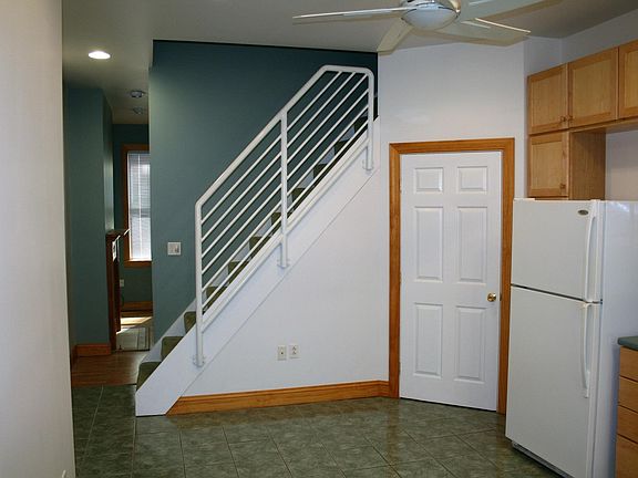 Kitchen view to stairs to floor 2