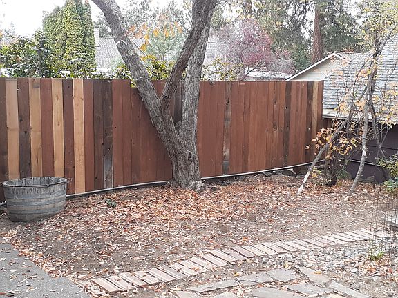 Fenced yard to alley