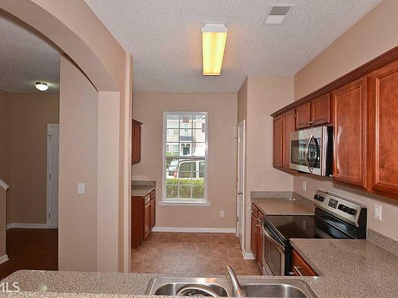 Natural light in the kitchen from a front-facing window.
