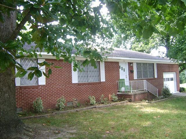1st image of 702 NW 8th St