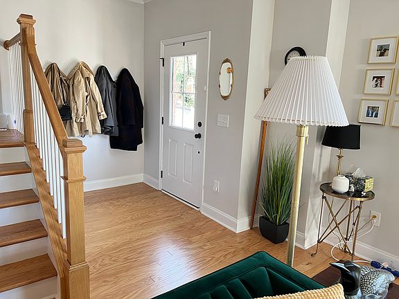 Front door entrance / stairway to upstairs