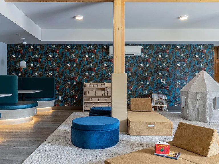 East Building Free Play amenity featuring an interior all-ages playroom
