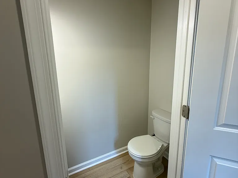 Powder room off of the kitchen