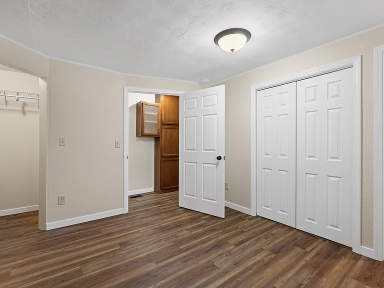 Bedroom with custom built-in storage