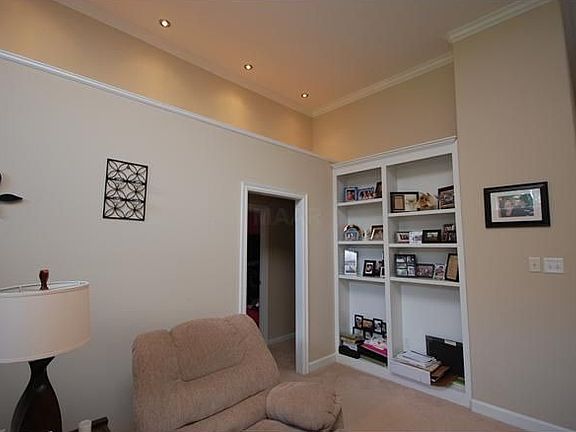 The Den/Great room also includes beautiful built in bookshelves.