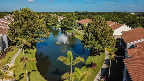 This aerial view encapsulates the essence of Soleil Blu, offering lakeside living and a vibrant community atmosphere. This hidden gem in St. Cloud is within your reach. Contact us today to learn more! - Soleil Blu Luxury Apartments