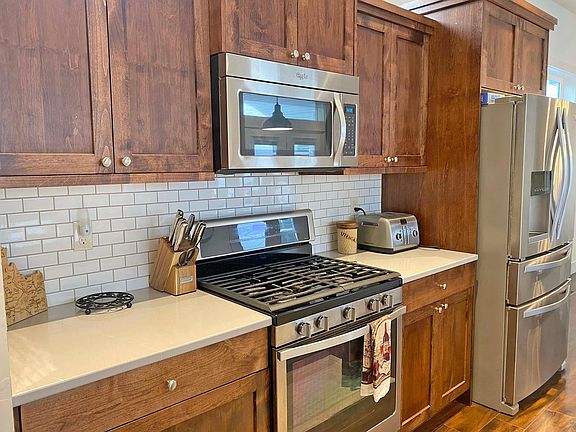 Kitchen with professional gas stove and oven