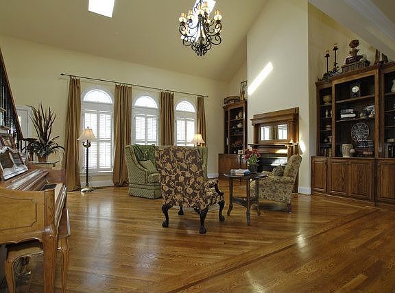 Two story Family Room overlooks expansive backyard