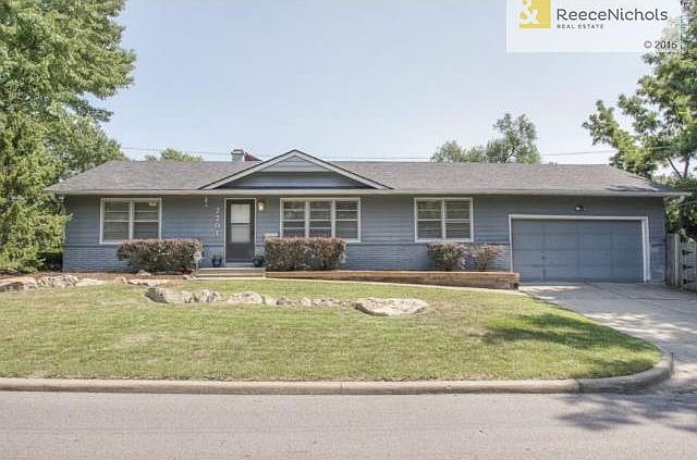 Sprawling ranch on landscaped corner lot