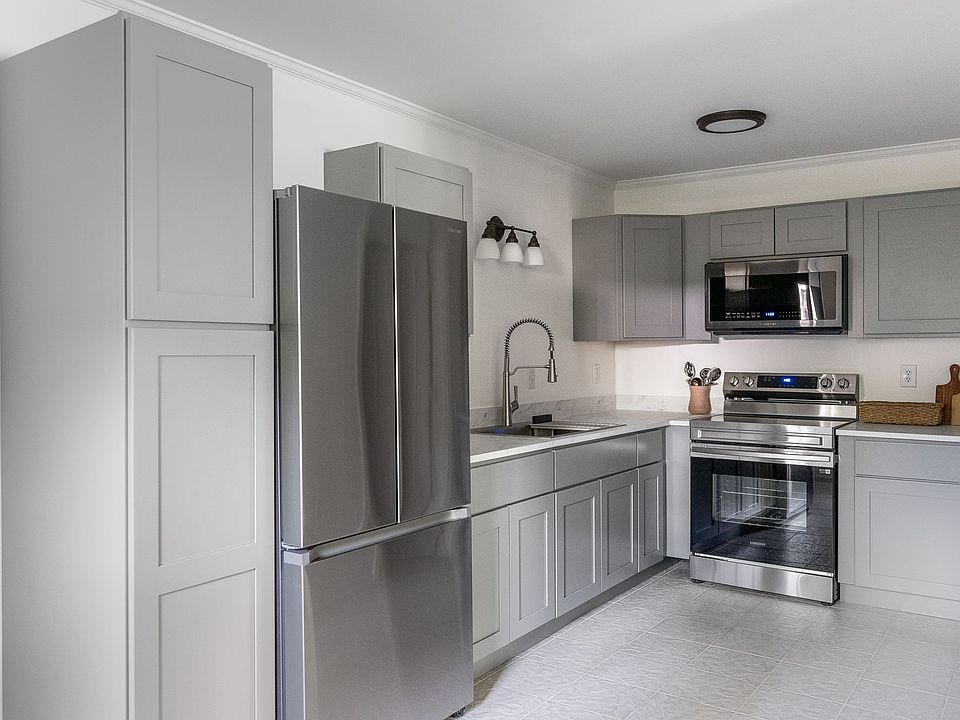 New kitchen with stainless appliances