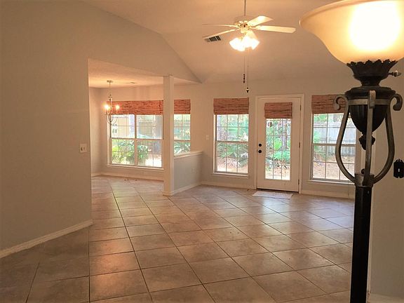 High ceilings and travertine floors.