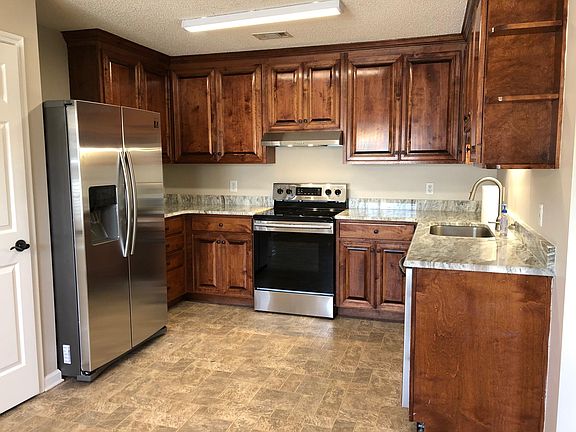 Kitchen with New Granite Countertops & Stainless Steel Appliances