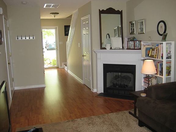 Bright and open living room with fireplace