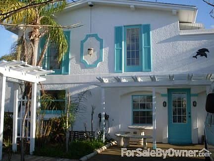 Front of house from the road with arbor : Ground level handicapped accessible entrance to in law apa