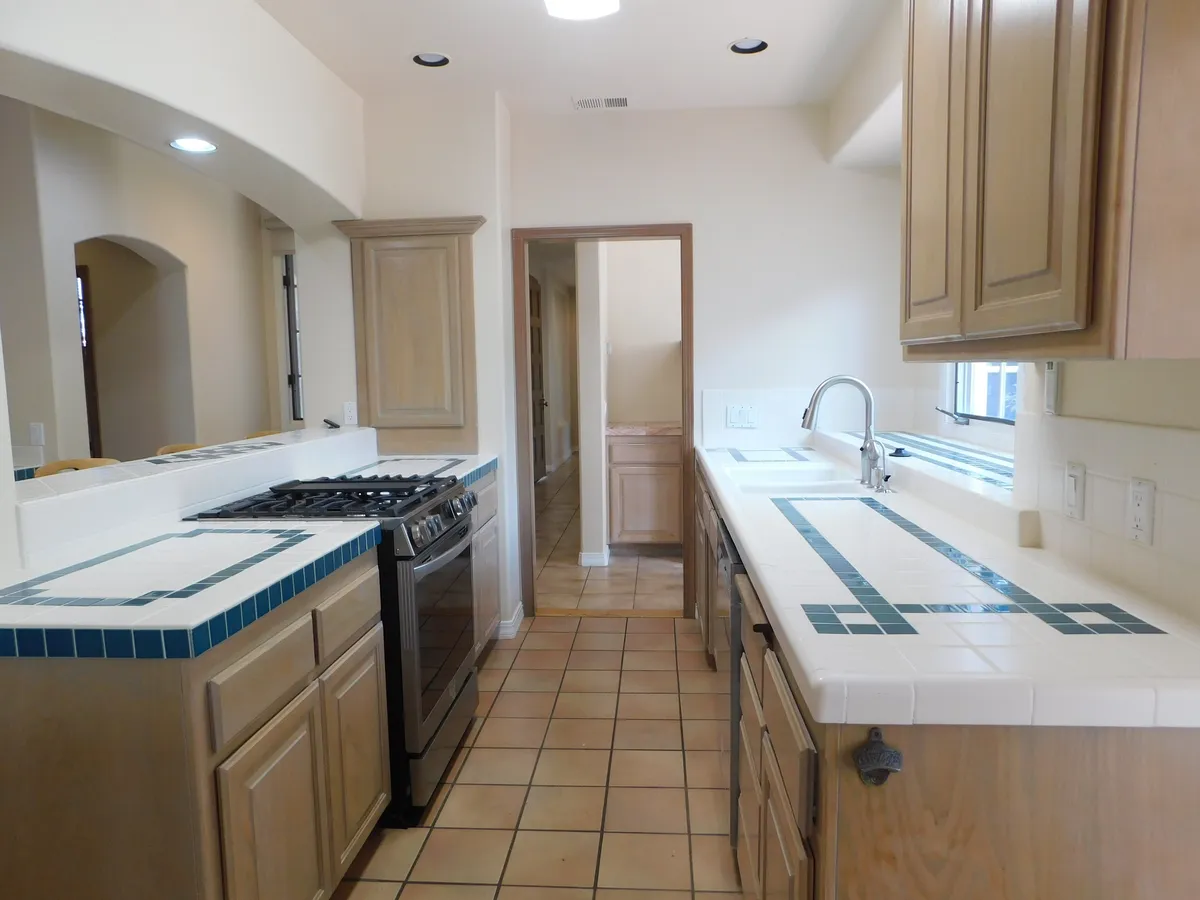 Kitchen with new appliances and pantry with counter seating - 4330 Modoc Rd