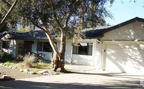 Front of home set back and under wonderful shade trees.