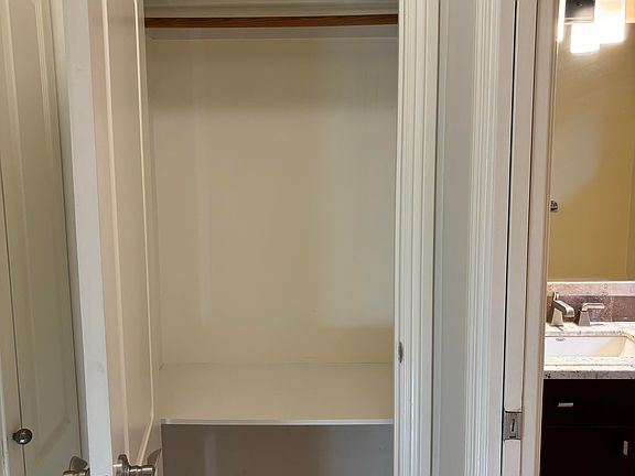 large closet between 1/2 bath and laundry area