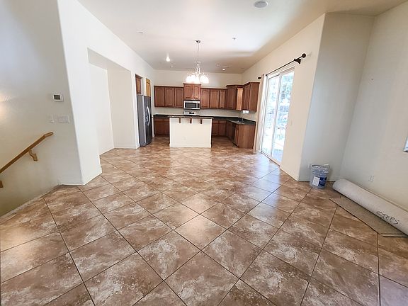 Great room to kitchen and dining