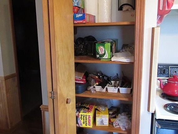 Nice pantry in the kitchen offers great storage.