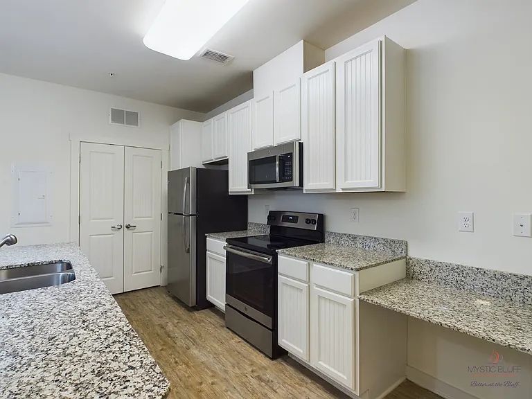 Mystic Bluff Apartments — Photo 52