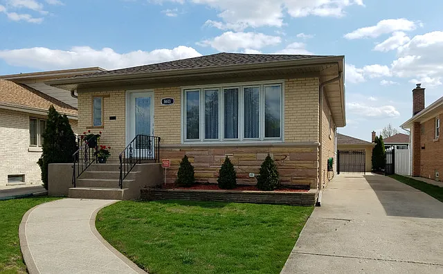 8616 W Argyle St photo 1