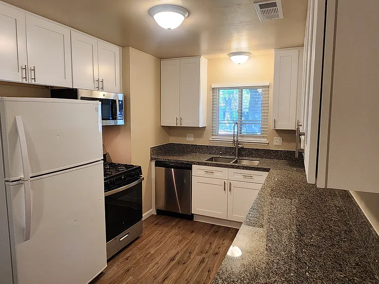 Kitchen with new cabinets and granite counter tops