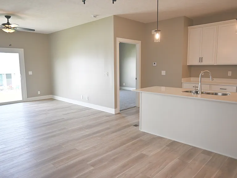 Kitchen, living room and bedroom entrance.