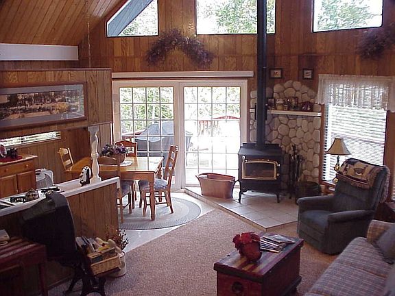 Friendly Great Room has a wall of windows