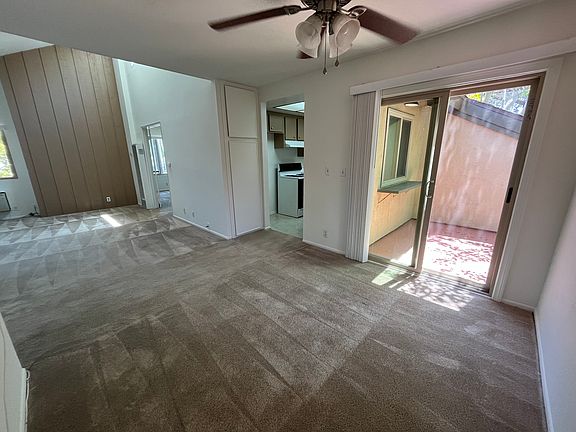 corner wall, looking to balcony and kitchen.