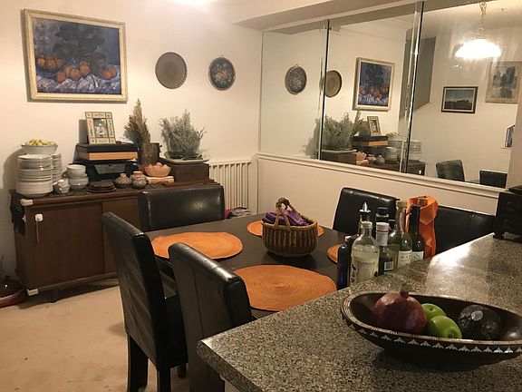 Dining are with built-in shelves (see other pic) and countertop open to kitchen.