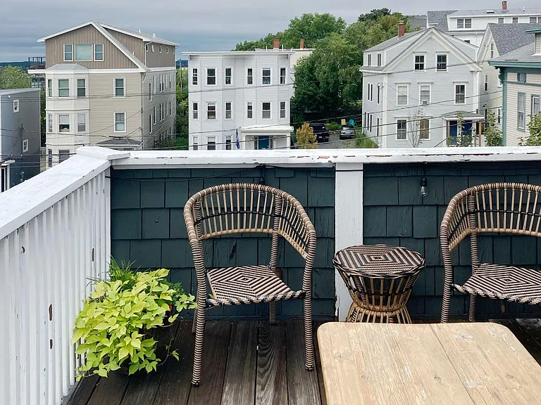 Sunset views toward Back Bay from private deck.