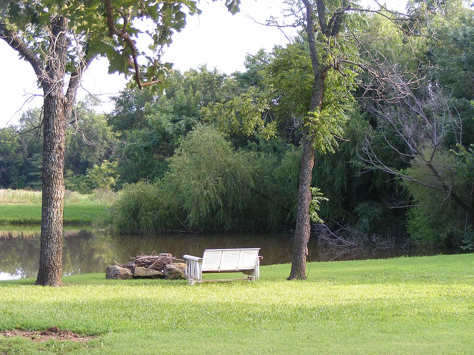 Pond/fire pit in backyard 