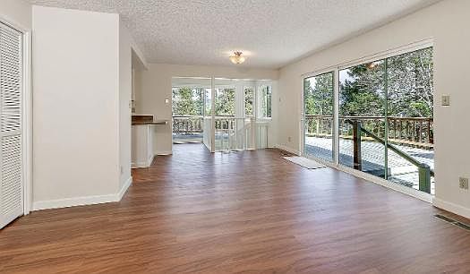 Second living/family room with extra breakfast nook/office space, pantry, and lots of light.