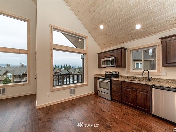 Photo shown is from a similar cabin. Interior finishes and color schemes have changed.