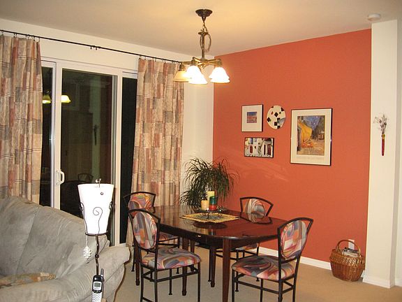 Dining room with sliders to backyard