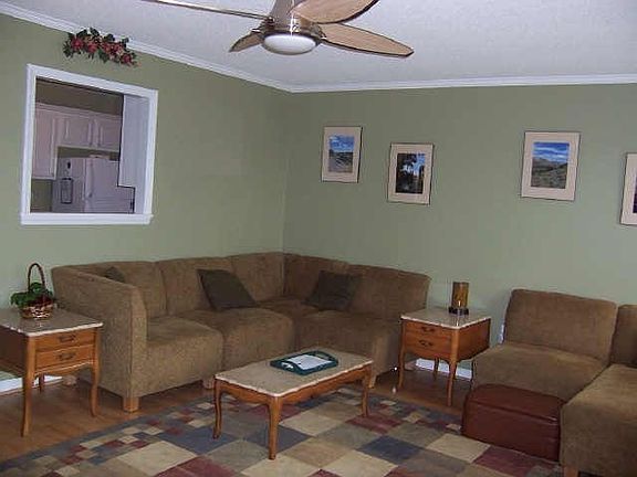 Den/living room, with window view into kitchen
