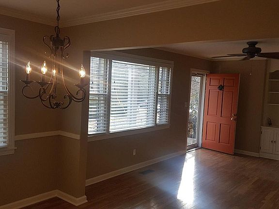 From Dining Room looking into Living Room **New custom blinds just installed..