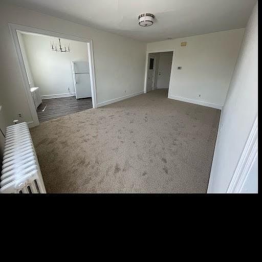 Living Room into Kitchen and Entryway