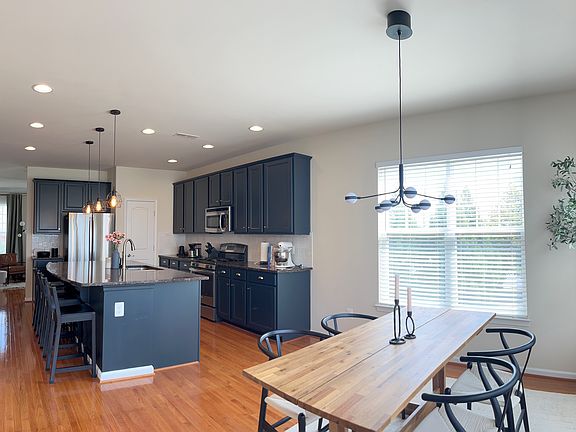 Sun-filled dining room next to the kitchen for easy living.