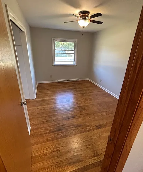 Bedroom 3 with freshly varnished hardwood floor