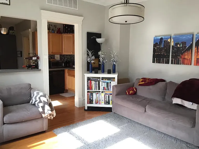 Elevate your living experience at LS Capital Group. This stylish living space features modern furnishings, hardwood floors, and abundant natural lightAaaperfect for relaxation and entertainment. Explore your new home today!