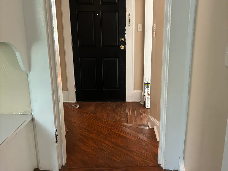 View of kitchen. Cut out to the front door