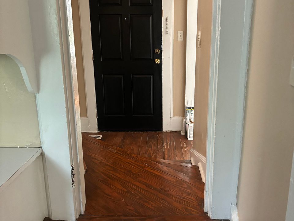 View of kitchen. Cut out to the front door