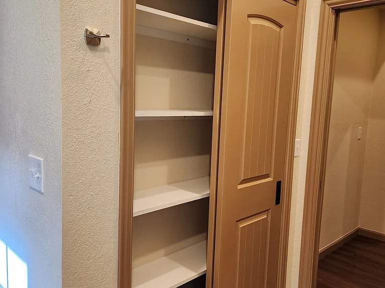 Linen closet in bathroom