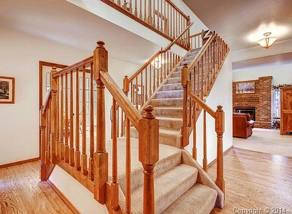 Functional open floor plan with spectacular grand staircase