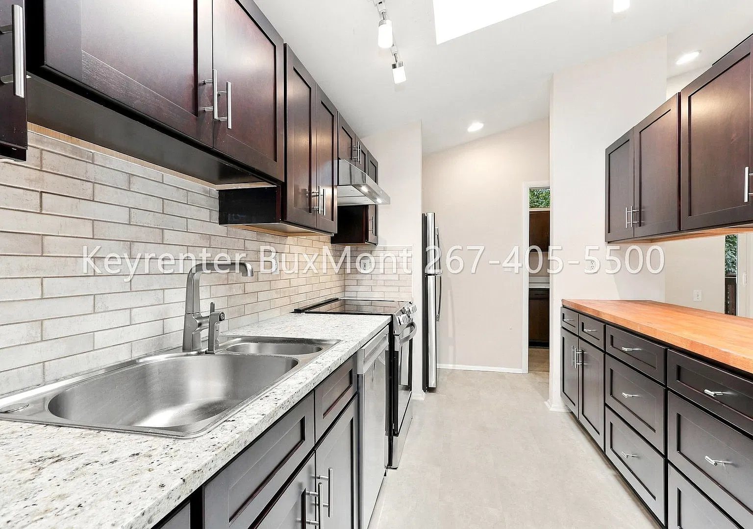 Bright and spacious single-family home with tons of windows, vaulted ceilings, and skylights — Photo 4